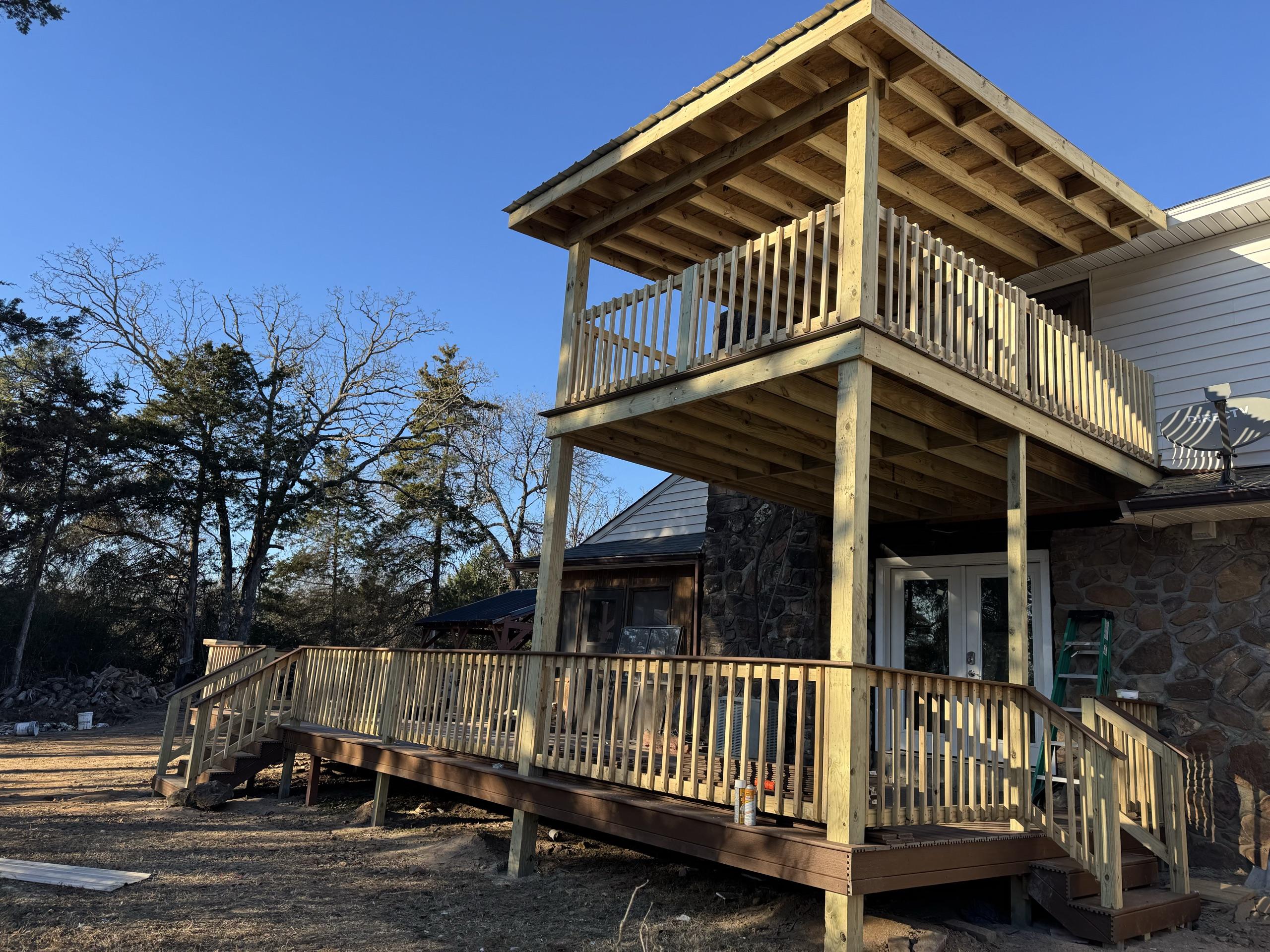 Custom elevated deck and home built by New Era Construction in the Arkansas River Valley